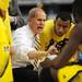 Michigan head coach John Beilein instructs his team during a time out in the second half at Cowboys Stadium on Sunday, March 31, 2013. Melanie Maxwell I AnnArbor.com